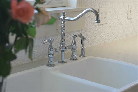 There should be no water coming out of any faucets, except a possible slight residual drip from the lowest faucet as any remaining water in the pipes dribbles out. Bellevue Bridge Kitchen Faucet with Brass Sprayer - Lever ...