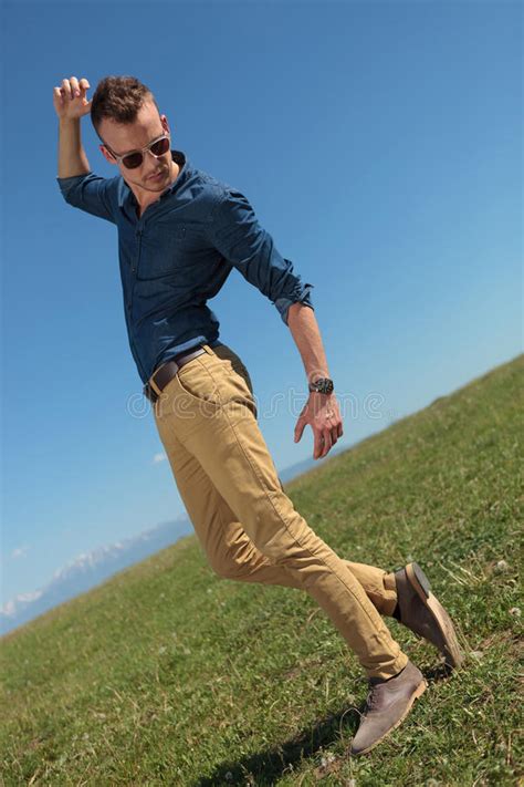 Outdoor Casual Man Looks Down Stock Image Image Of Environment Grass