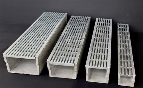 A trench drain must be covered by a grate to keep it free of debris that could clog the pipe. DriveDrain | Mascot Engineering
