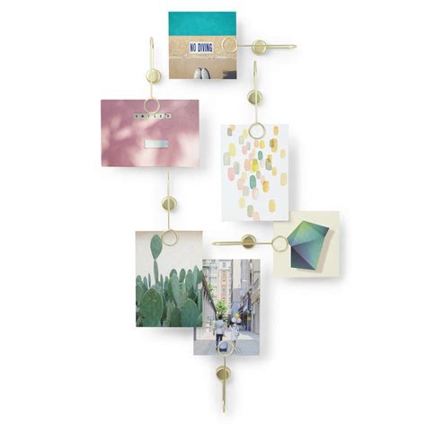 With a strong use of materials, shape, space, and color this frame can change the way you look at your art. Display de fotos PHANTOM Dourado Umbra - Soluza