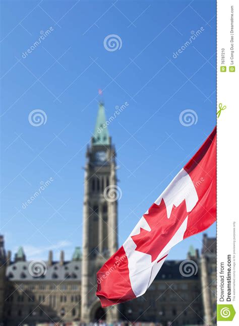 Canadian Flag Waving In Front Of The Parliament Stock Photo Image Of