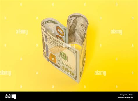 100 Dollar Bill In Heart Shape Hi Res Stock Photography And Images Alamy