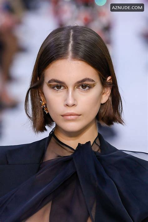 kaia gerber in a see through blouse at the valentino spring summer 2020 fashion show in paris