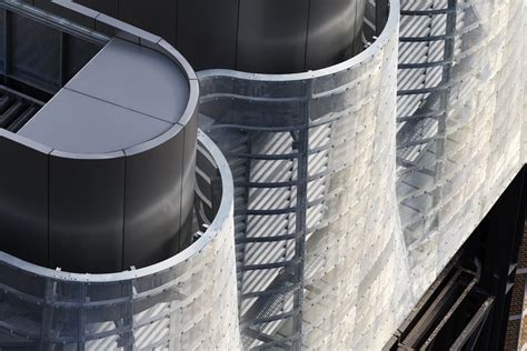 Tzannes Associates Hide Trigeneration Cooling Towers With