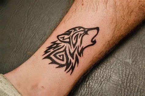 40 Tribal Wolf Tattoo Ideas And Designs Tats N Rings