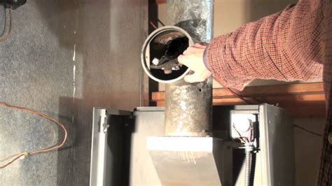 Only one boiler may be exhausted through each vent hood. Should you plug the sensing hole in the oil furnace vent ...