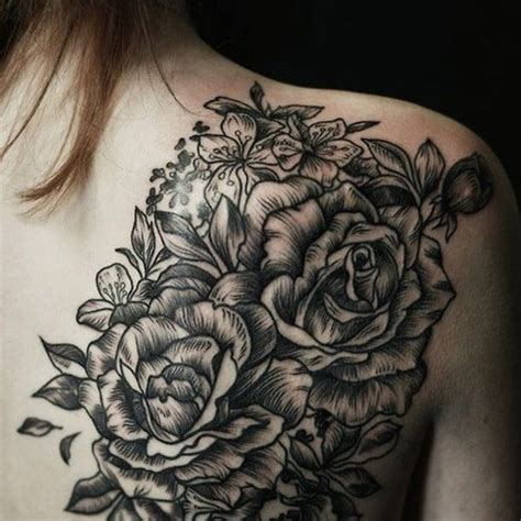 Typical black ink linework style scapular tattoo of big rose. 10 Beautiful Linework Rose Tattoos | Tattoodo