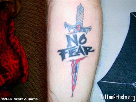 No Fear Tattoo Design With Dagger On Leg Finished Fear Tattoo Tattoo Designs