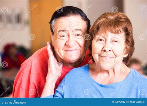 Smiling Hispanic Couple In A Senior Center Stock Photo Image Of