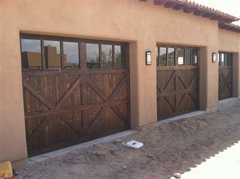 About our handcrafted garage doors. Solid Wood Garage Doors - Rustic - Garage - Phoenix - by ...