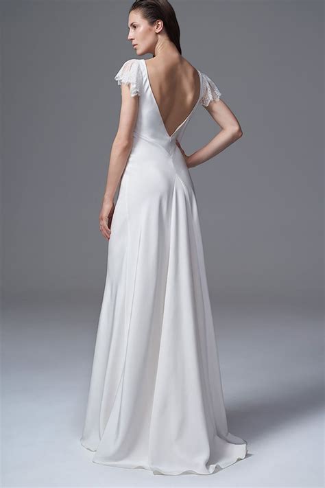 Thin threads, which are the base of the silk cloth, provide the beauty of its surface and ecological properties. THE VERA SILK CREPE DRESS WITH FRENCH LACE FRILL SLEEVES ...