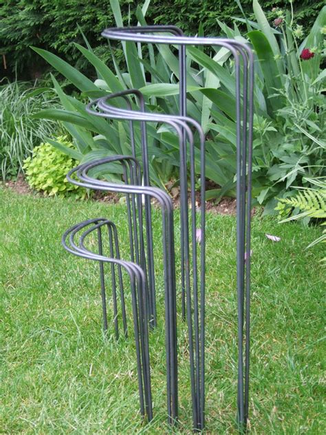 Garden hoops are more likely to stay erect if they are slipped into sleeves made from rigid metal or pvc pipe. 3 x "Bow-Type" Garden Plant Supports. Made from Solid 6mm Metal, • £7.50 (With images) | Garden ...