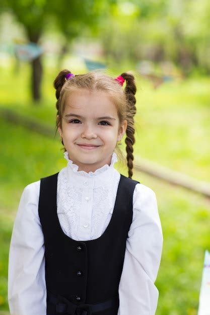Premium Photo Portrait Of A Beautiful Schoolgirl Girl Outdoors
