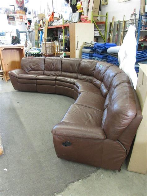 Compared to a regular sofa, they provide a wide lounge to stretch out on for added comfort. 6 Seat curved brown leather sectional sofa