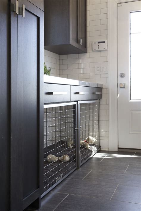 Custom built in dog bed / crate in this mudroom makes for a tidy, pet
