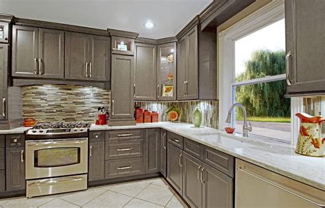 Dark gray kitchen ideas that decorated with varies of backsplash pattern tiles! Glazed%2520Stone%2520Grey%2520Kitchen%2520Cabinets | Grey kitchen cabinets, Kitchen cabinets ...
