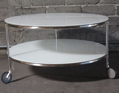 21 round coffee table white quartz crystal black iron base glass top 1379. Rented Elegance - Props - Detail