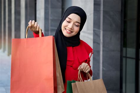Happy Smiling Young Asian Muslim Women Wearing Black Headscarf Hijab In