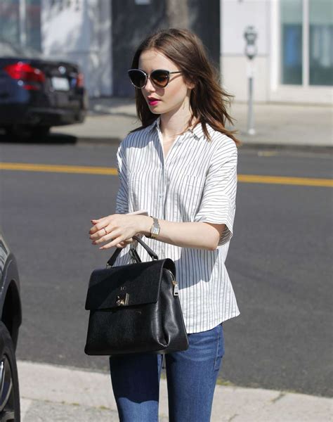 Lily Collins In Jeans Shopping In Beverly Hills Gotceleb