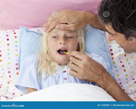 Father Checking His Daughter S Temperature Stock Image Image Of