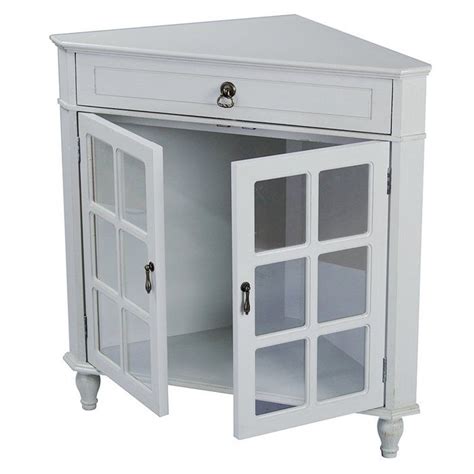 A White Corner Cabinet With Glass Doors