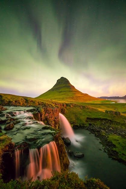 Premium Photo Northern Light Over Kirkjufell Mountain In Iceland