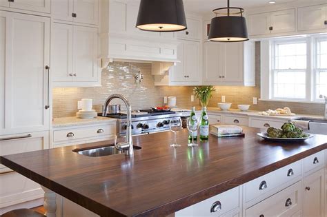 Calculate costs of cupboards sizes like 10x10, 12x12. White Kitchen Island with Dark Wood Countertop ...