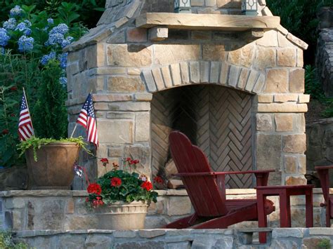 If you choose to paint your brick fireplace you can also flip this idea, by placing larger framed items in the center, and smaller items along the exterior border. Outdoor Stone Fireplace Warming Up Exterior Space - Traba ...