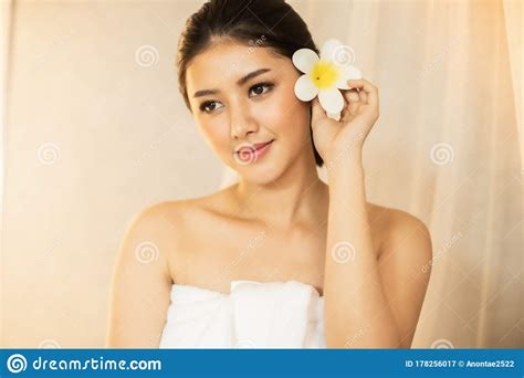 Asian Beautiful Young And Healthy Woman In Spa Salon Massage Treatment Spa Room Stock Image