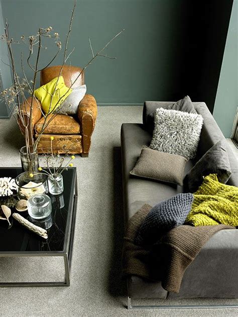 Select minimalist, red sectional sofa with white throw pillows as seen here. 37 Green And Grey Living Room Décor Ideas - DigsDigs