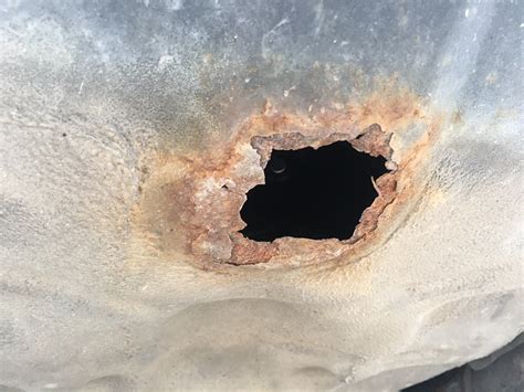 Checkout this quick 5 min automotive diy tip for fixing a flat tire body work - Large rust hole in spare tire area ...