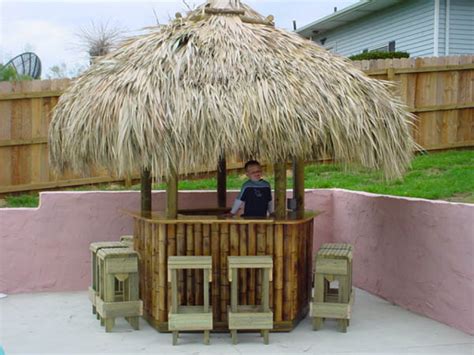 Amscan tiki bar hut, includes reusable tiki bar hut and decorative hibiscus garlands. Custom Made Palm Trees - Residential Tiki Huts