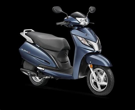 The digital analog console is eye catching esp when illuminated. Honda Activa 125 Expert Review | Advantage | Disadvantage ...