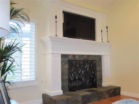 Fireplace hearth and mantel makeover 02:09. Custom wood fireplace with slate tile hearth and inset ...