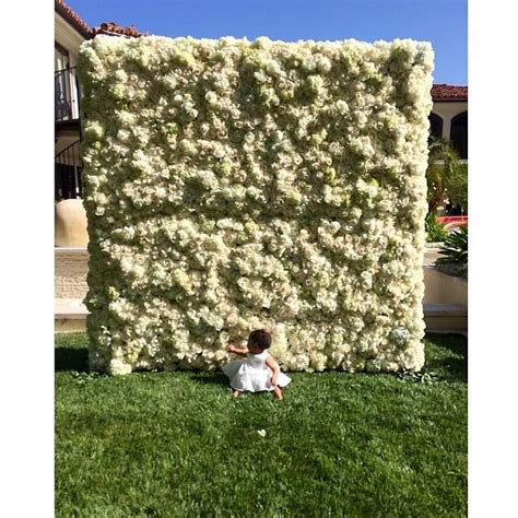Kanye Wests Long And Complicated History With Flower Walls Elle