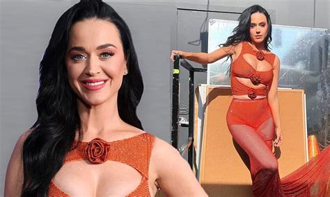 katy perry stuns as she shows skin in sexy sheer orange number with cutouts for american idol