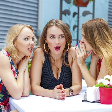 Three Beautiful Girlfriends Gossiping Woman Sitting At A Table I Stock