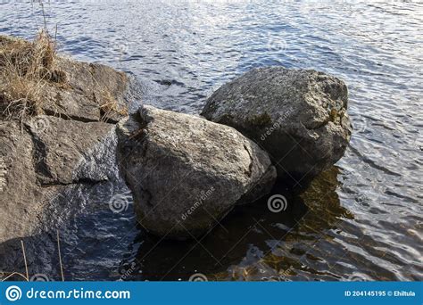 Two Boulders On A Rocky Lake Shore Stock Image Image Of Tourism