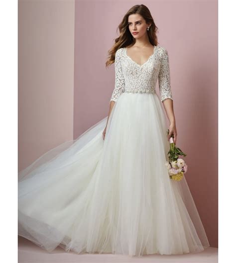 An elegant and refined long sleeve lace wedding gown with a floor length veil and custom brian atwood bridal pumps. WEDDING DRESSES WITH SLEEVES: LONG-SLEEVED GOWNS YOU'LL LOVE