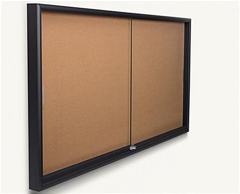 Nonmagnetic melamine surface resists scratching. 72" x 36" Large Cork Board w/ Black Aluminum Frame
