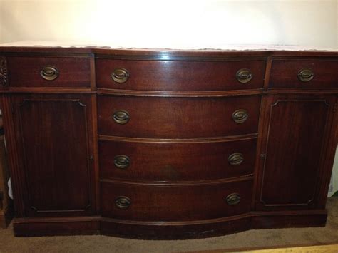 Well you're in luck, because here they come. Drexel Furniture Buffet antique appraisal | InstAppraisal