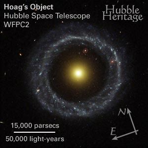 Ring Of Hot Blue Stars Pinwheels Around Yellow Nucleus Of Hoag S Object