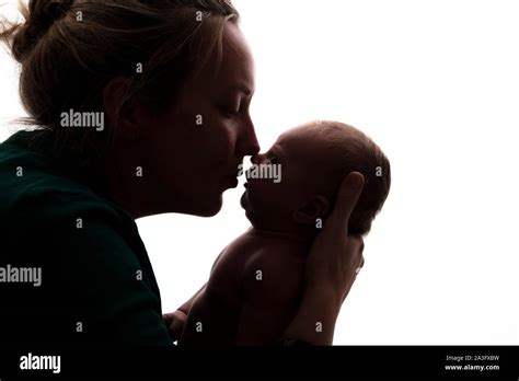 Mother Holding Baby Silhouette Hi Res Stock Photography And Images Alamy