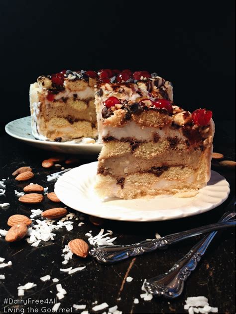 Russian lady finger cake consists of pate a choux dough, sour cream filling, and a beautiful & easy fresh fruit decoration (strawberry and kiwi). Dairy Free Frozen Lady Finger Cake - Living The Gourmet
