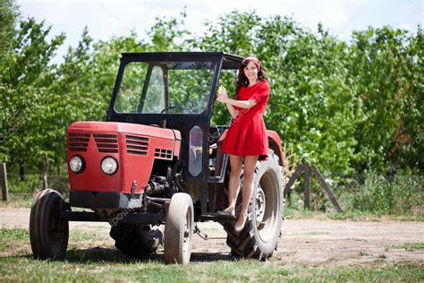 Country Girl On Tractor Stock Photo By ©luckybusiness 12297466