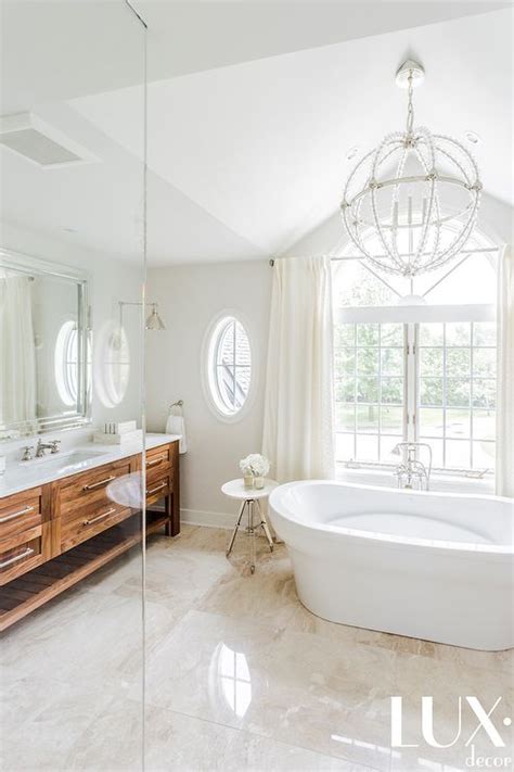 Maybe you would like to learn more about one of these? Beautiful bathroom features a Danville Sphere Chandelier ...