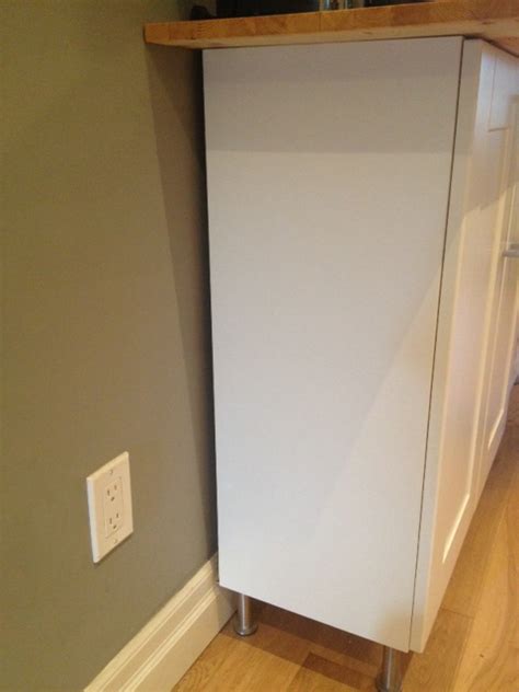 Remove the drain lines (and garbage disposer, if there is one) to get maneuvering room. Kitchen Cabinet Cover Panels - Storefront Life