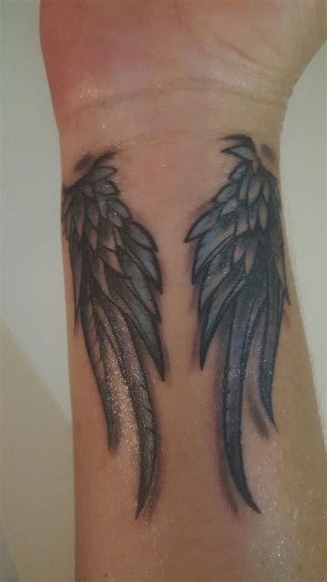 Angel wings tattoo on wrist. How to Make an Interesting Art Piece Using Tree Branches ...