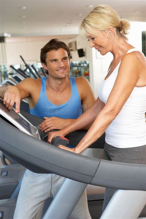 Senior Woman Working With Personal Trainer Stock Photo Image Of