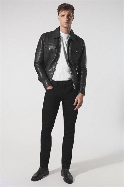 men s black jeans and leather jacket outfit with chelsea boots this outfit first appeared in